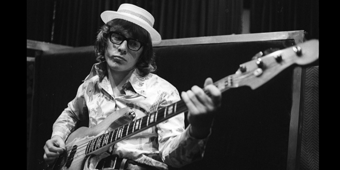 Peter Asher playing the guitar